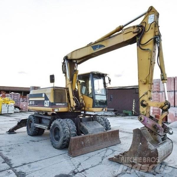 CAT M 315 Escavatori gommati