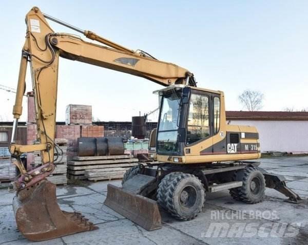 CAT M 315 Escavatori gommati