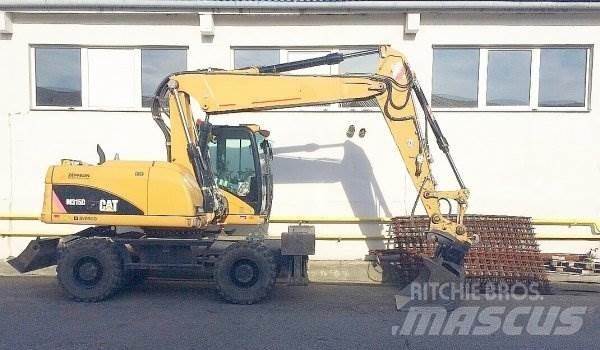 CAT M 315 D Escavatori gommati
