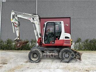 Takeuchi TB295W Escavatori gommati