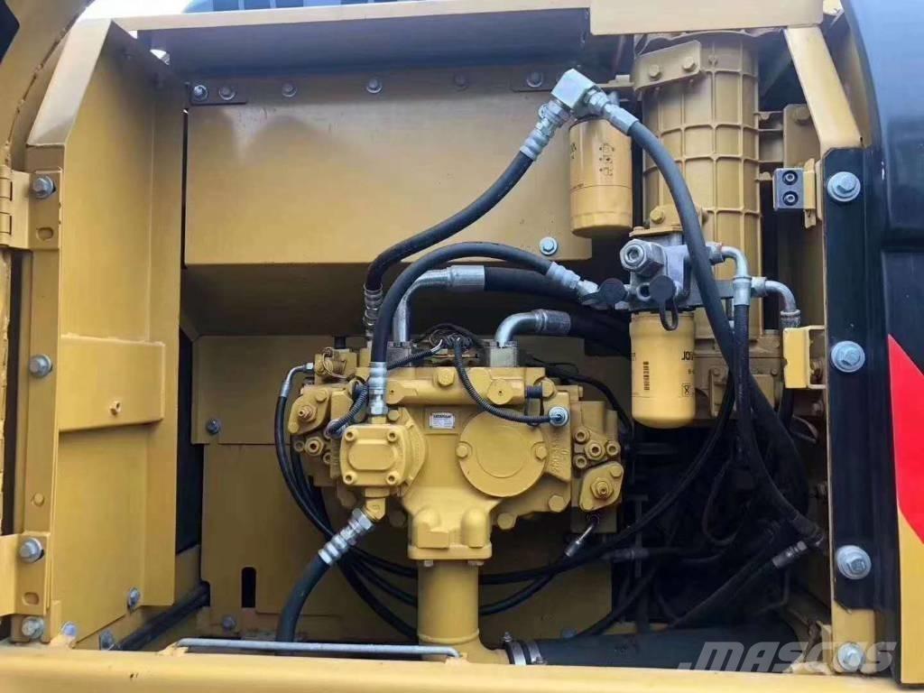 CAT 323 Escavatori cingolati