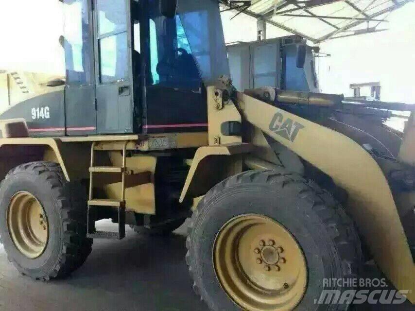 CAT 914G Pale gommate