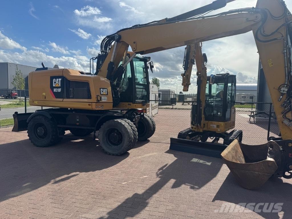 CAT 318 Escavatori gommati