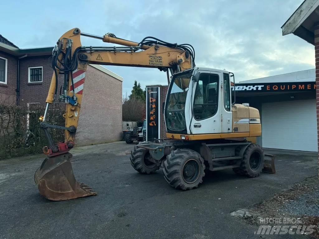 Liebherr A312 Escavatori gommati