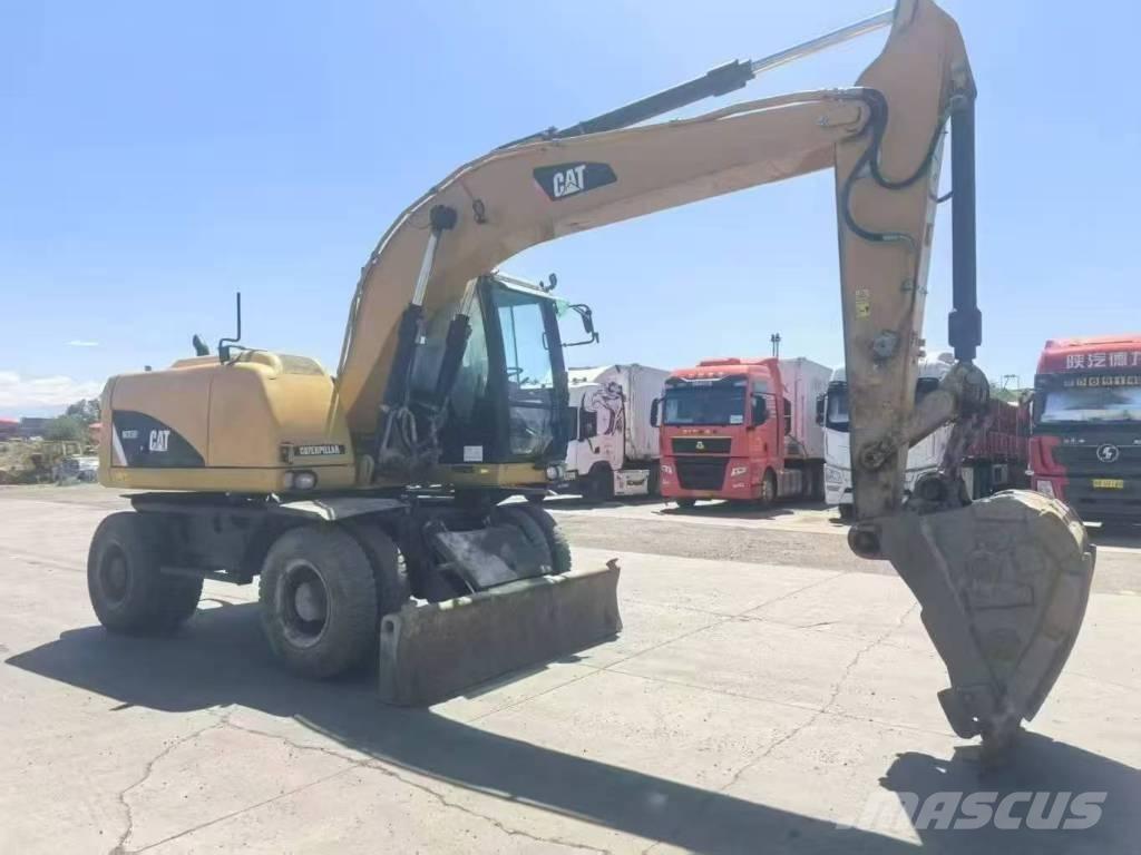 CAT M315D2 Escavatori gommati