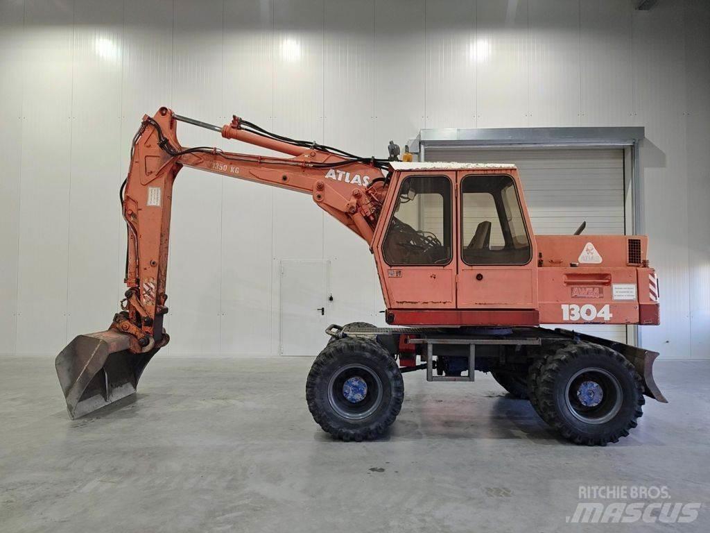 Atlas 1304 Escavatori gommati