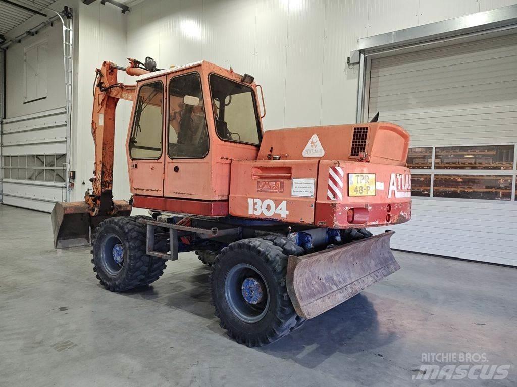 Atlas 1304 Escavatori gommati