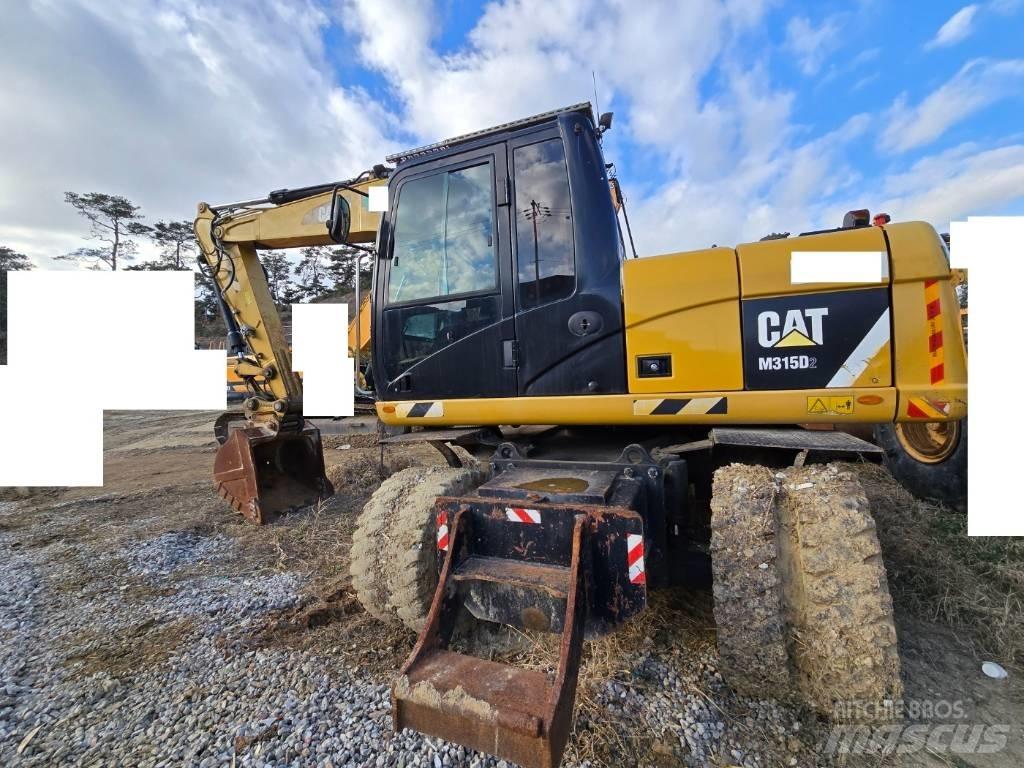 CAT M 315 D Escavatori gommati