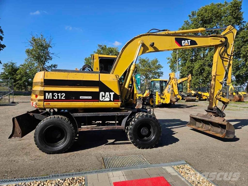 CAT M 312 Escavatori gommati
