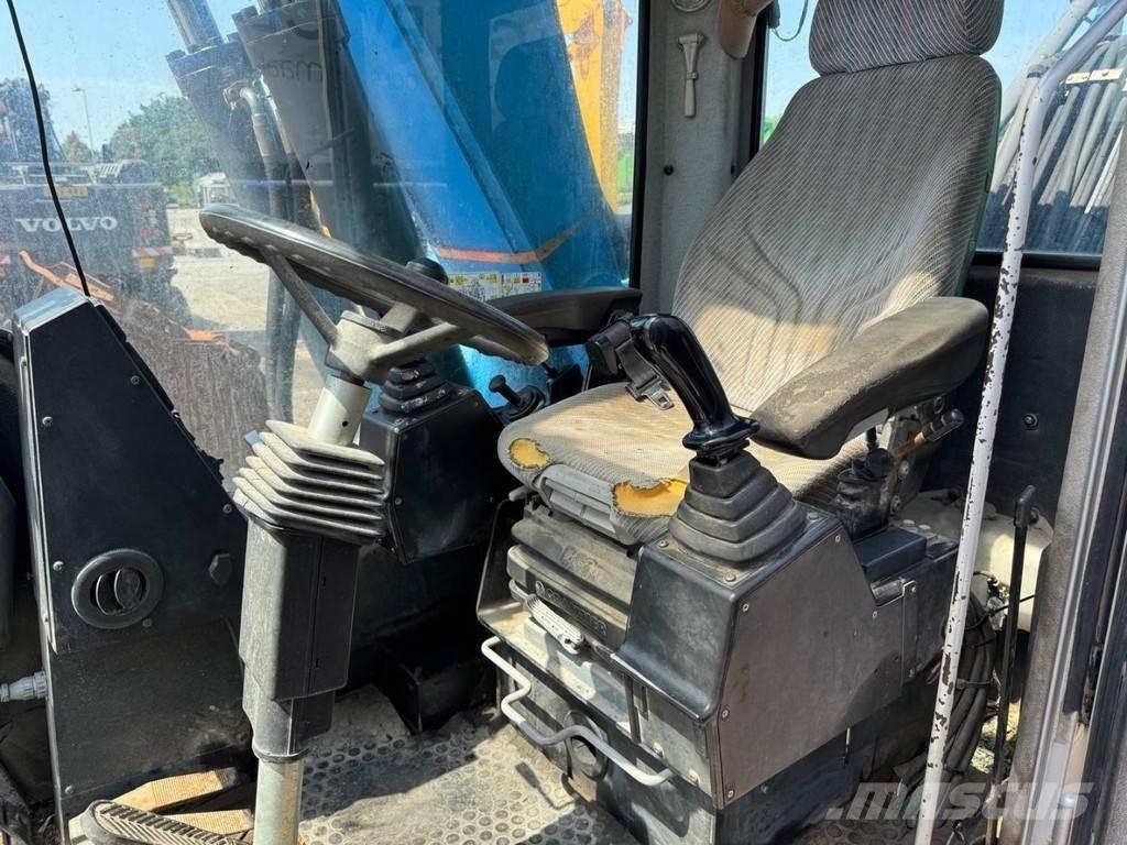 Fuchs MHL 320 Movimentazione rifiuti