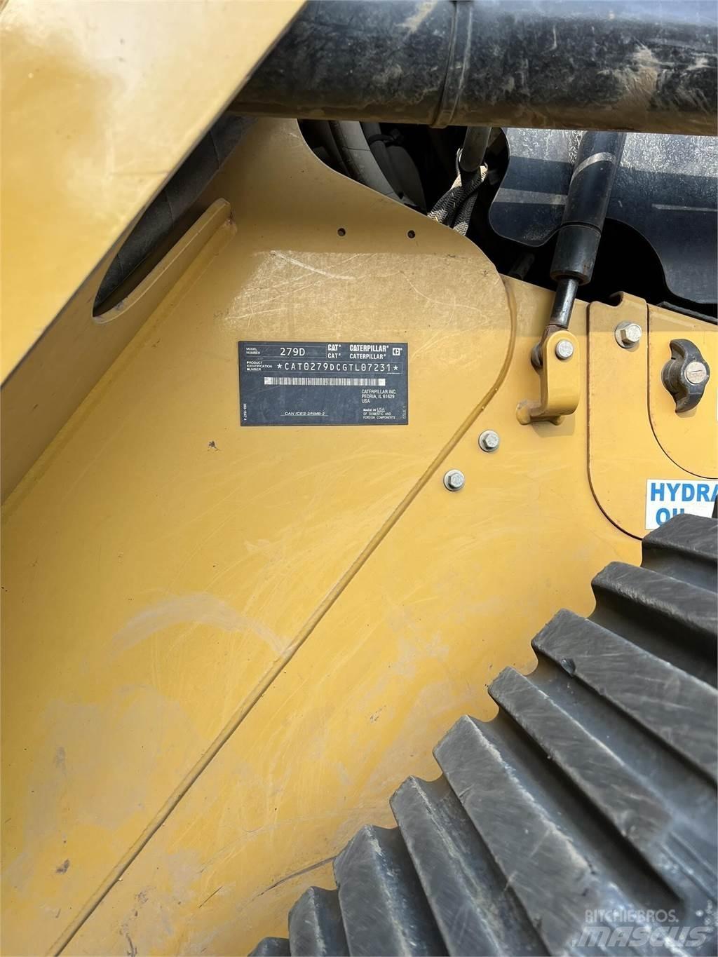CAT 279D Mini Pale Gommate