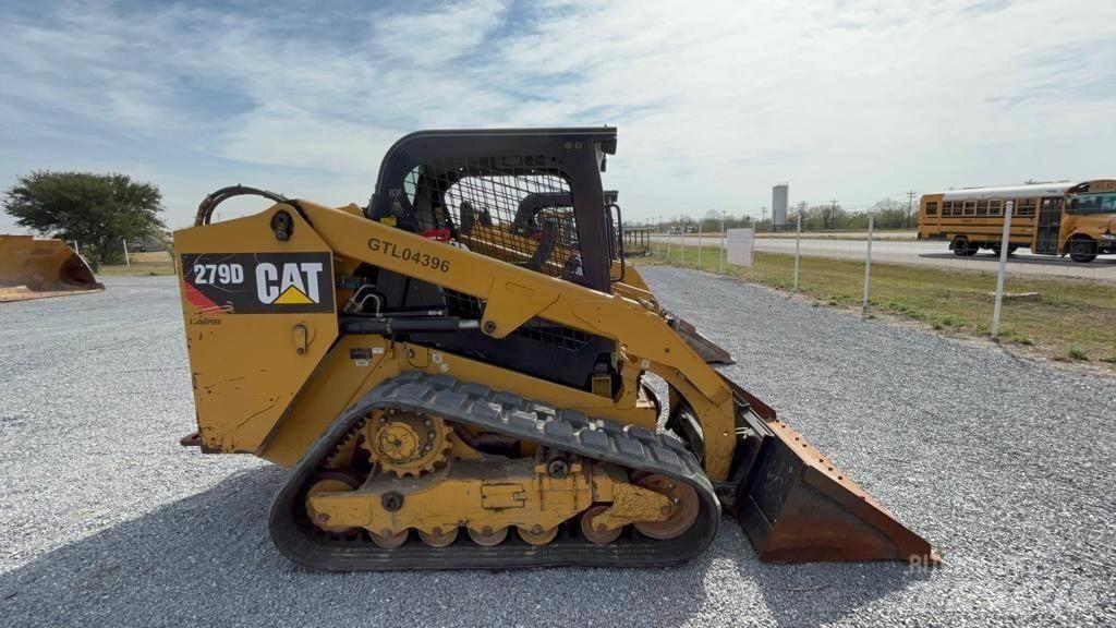 CAT 279D Mini Pale Gommate