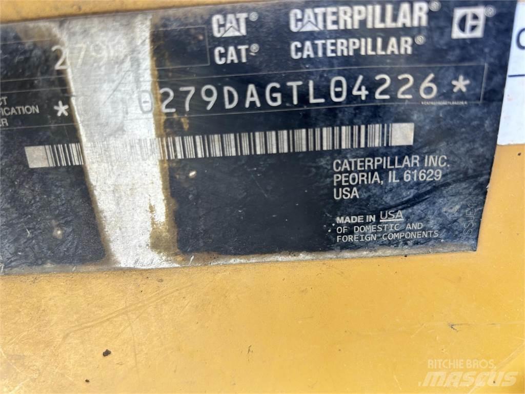 CAT 279D Mini Pale Gommate