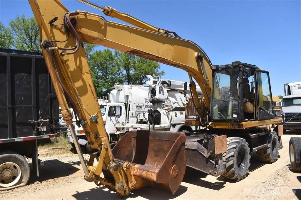 CAT M318 Escavatori gommati