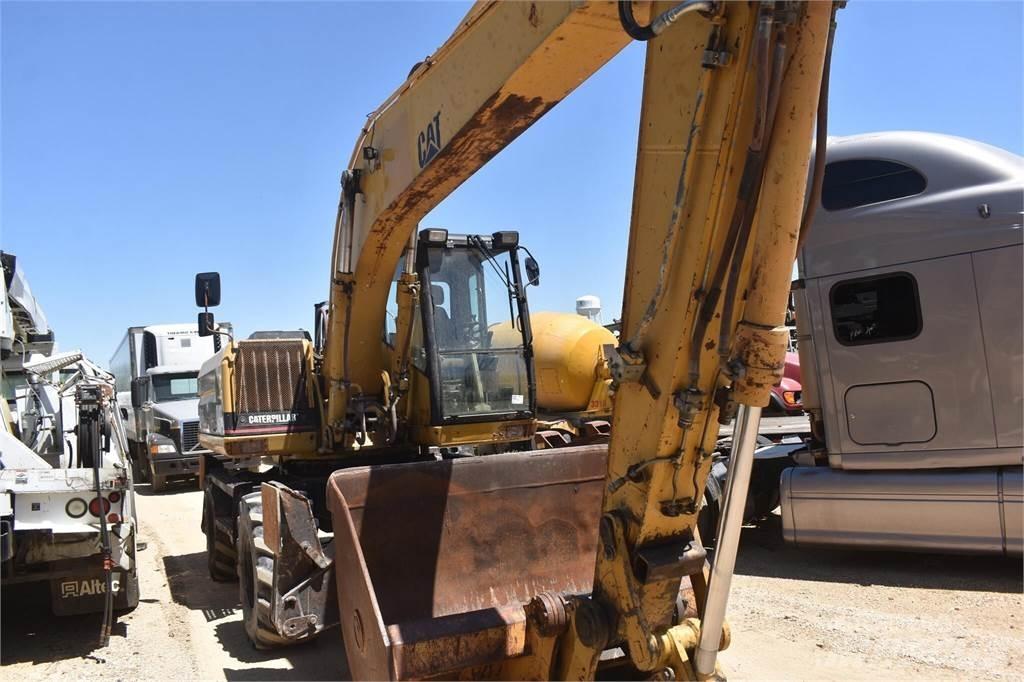 CAT M318 Escavatori gommati