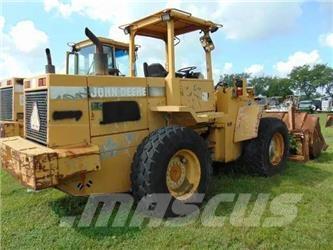 John Deere 544G Pale gommate