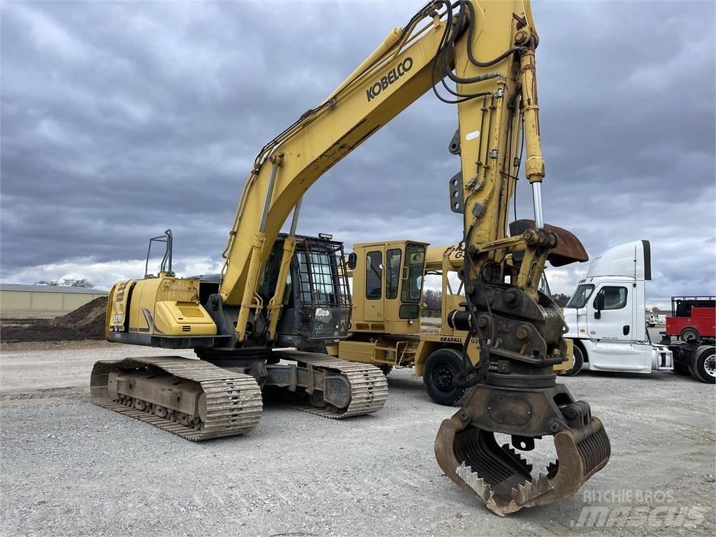 Kobelco SK210 LC-9 Caricatronchi con base su rimorchio