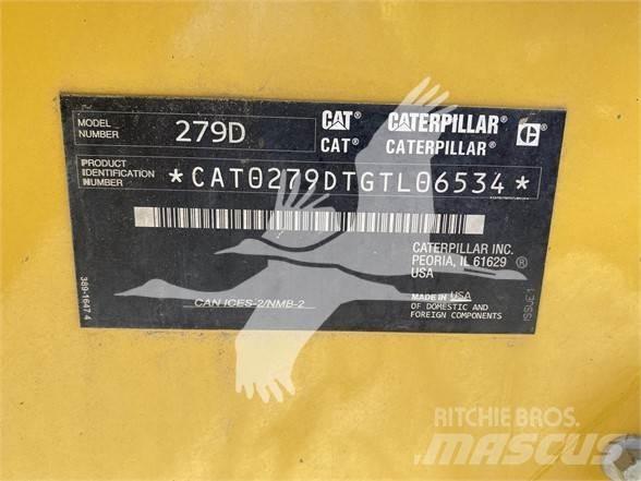 CAT 279D Mini Pale Gommate