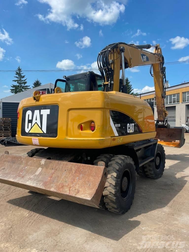 CAT M 313 D Escavatori gommati