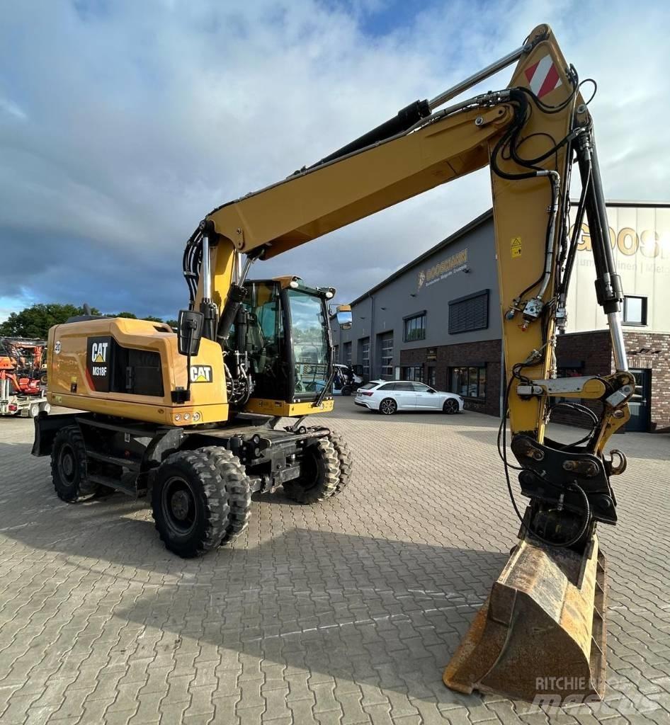 CAT M 318 F Escavatori gommati