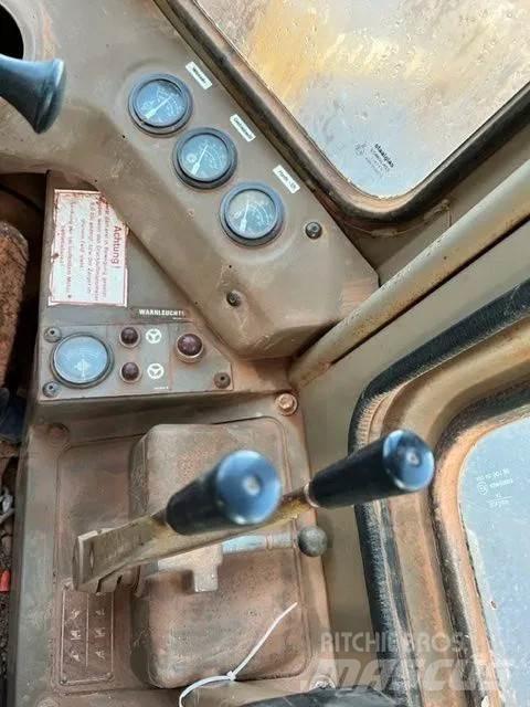 CAT 966D Pale gommate