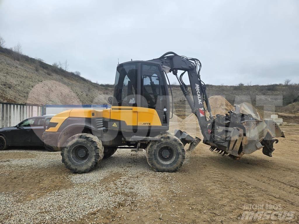 Mecalac 12 M TX Escavatori gommati
