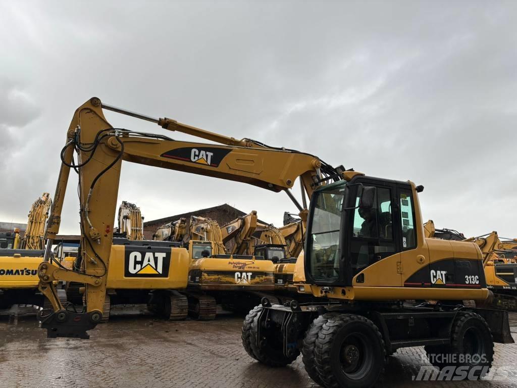 CAT M 313 C Escavatori gommati