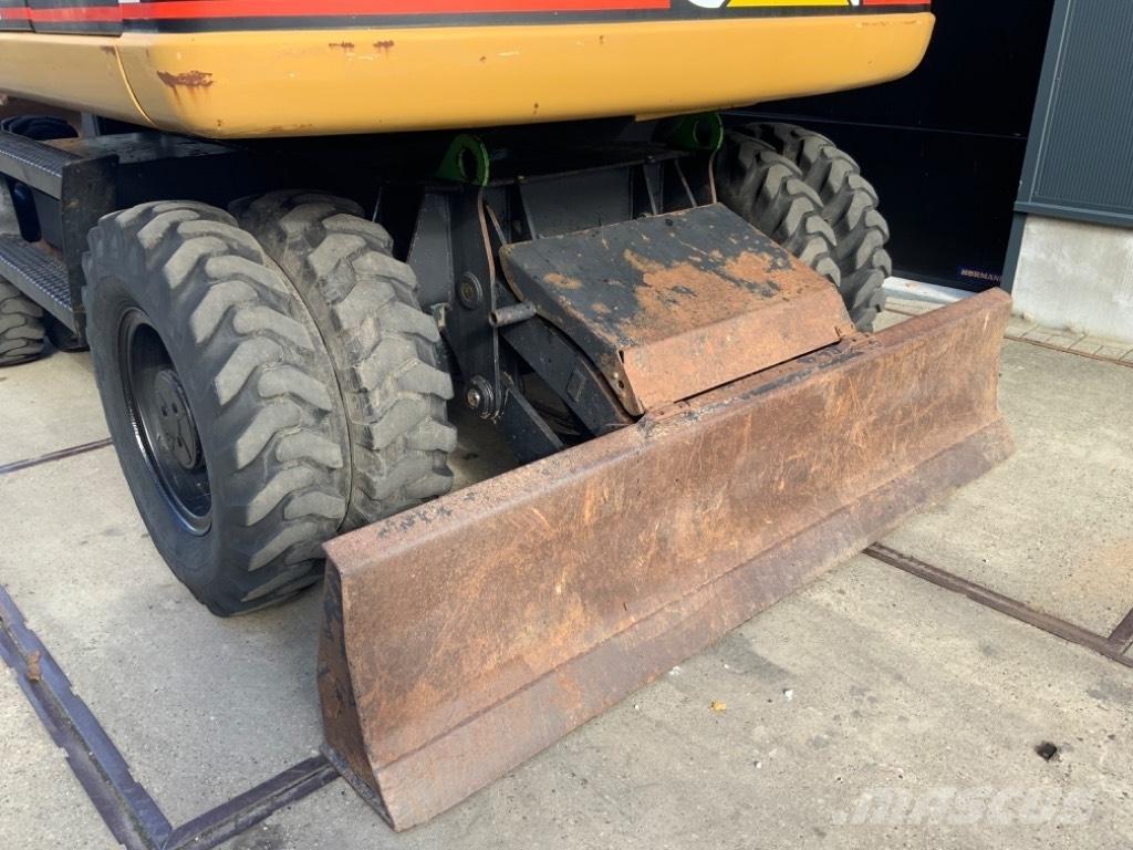 CAT M 313 C Escavatori gommati