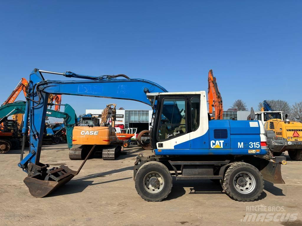 CAT M 315 Escavatori gommati