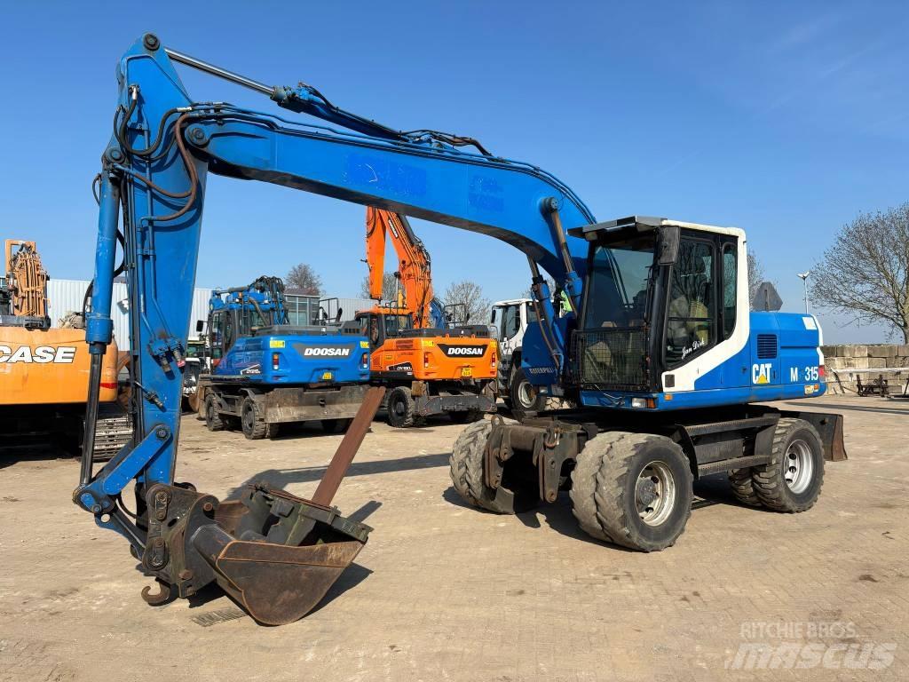 CAT M 315 Escavatori gommati