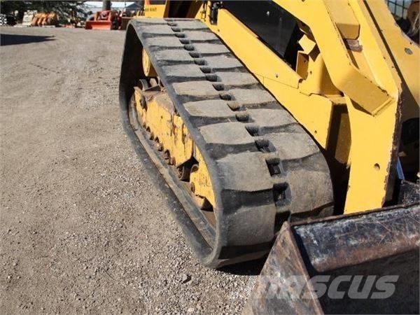 CAT 289 D Mini Pale Gommate