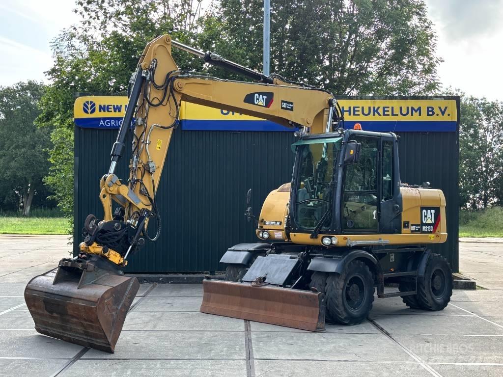 CAT M 313 D Escavatori gommati