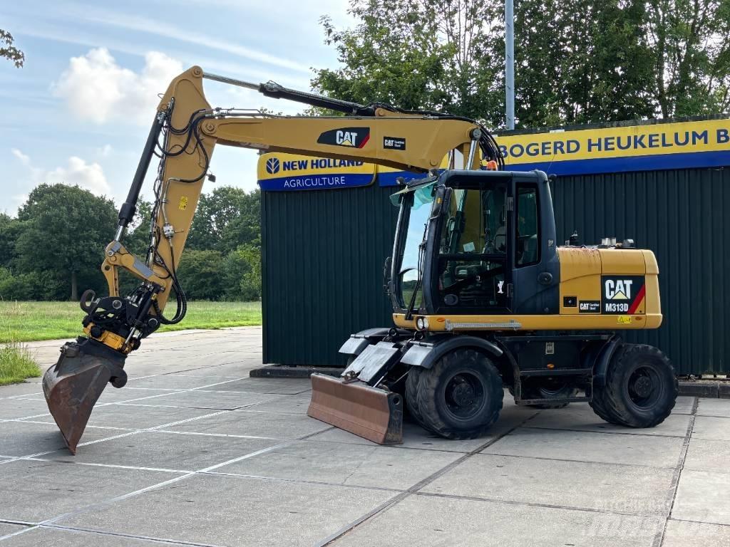 CAT M 313 D Escavatori gommati