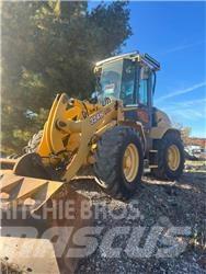 John Deere 324H Pale gommate
