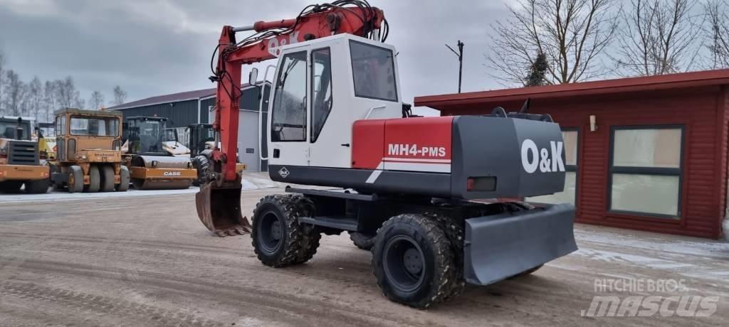 O&K MH 4 PMS Escavatori gommati