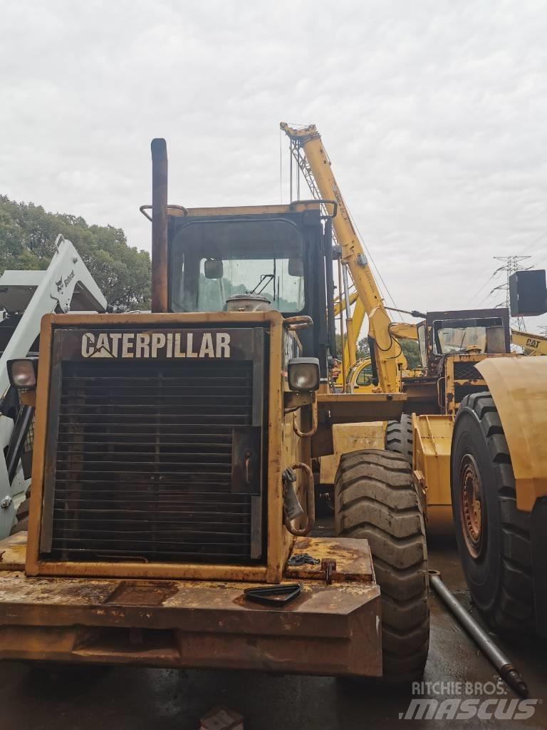 CAT 938F Pale gommate