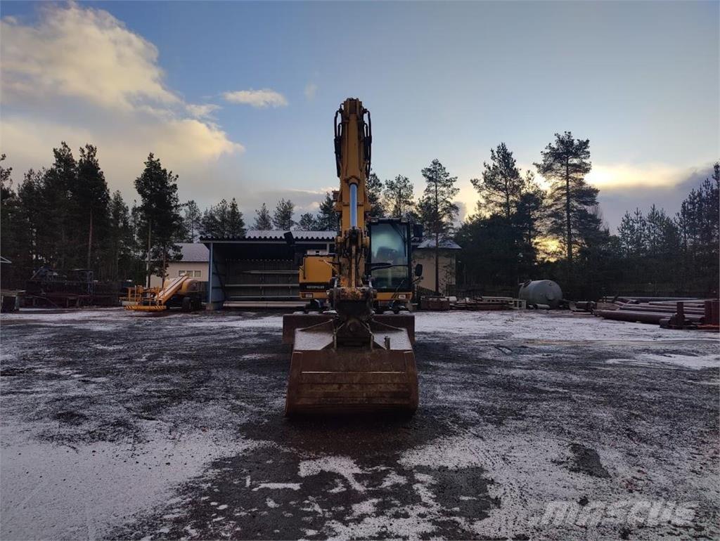 CAT M315 Escavatori gommati