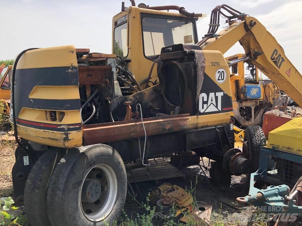CAT M 312 FOR PARTS Escavatori gommati