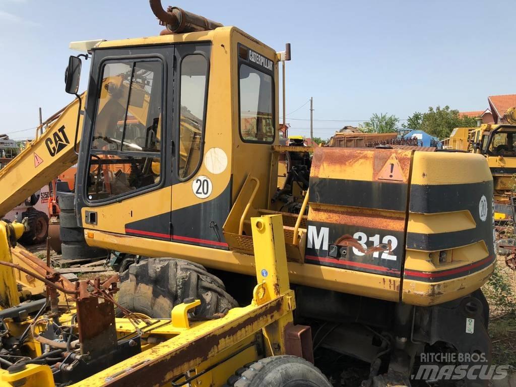CAT M 312 FOR PARTS Escavatori gommati