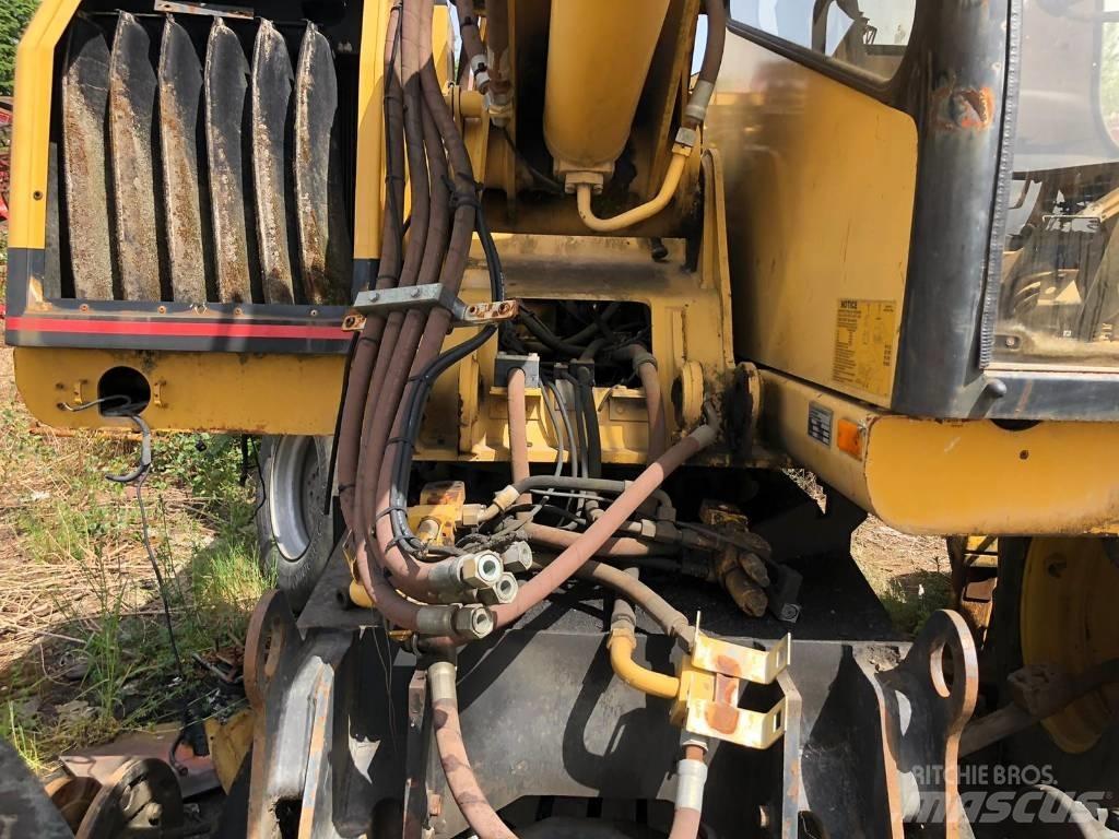 CAT M 312 FOR PARTS Escavatori gommati