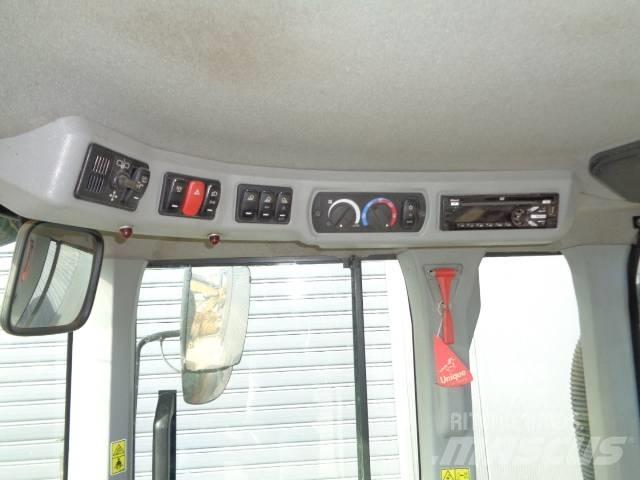 CAT 938M Pale gommate