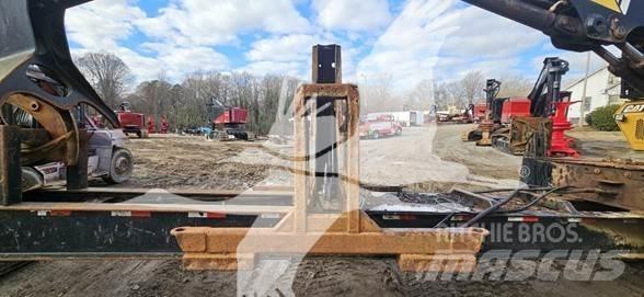 CAT 559C Caricatronchi con base su rimorchio