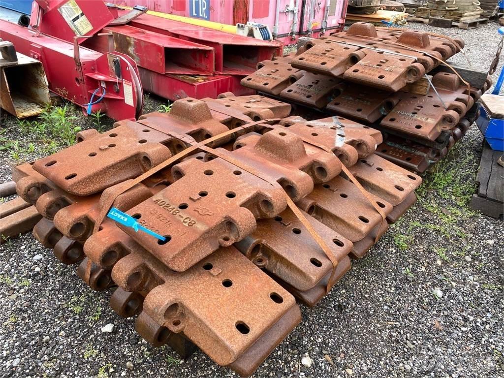 Manitowoc  Catene, cingoli e sottocarro