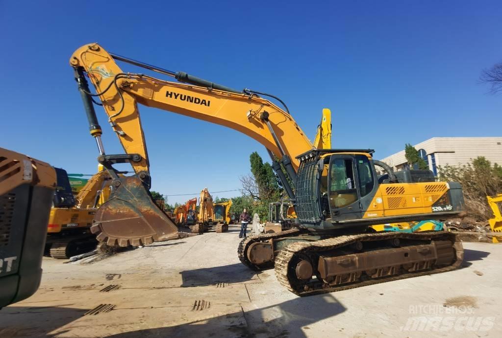 Hyundai 520L-9 VS Escavatori cingolati