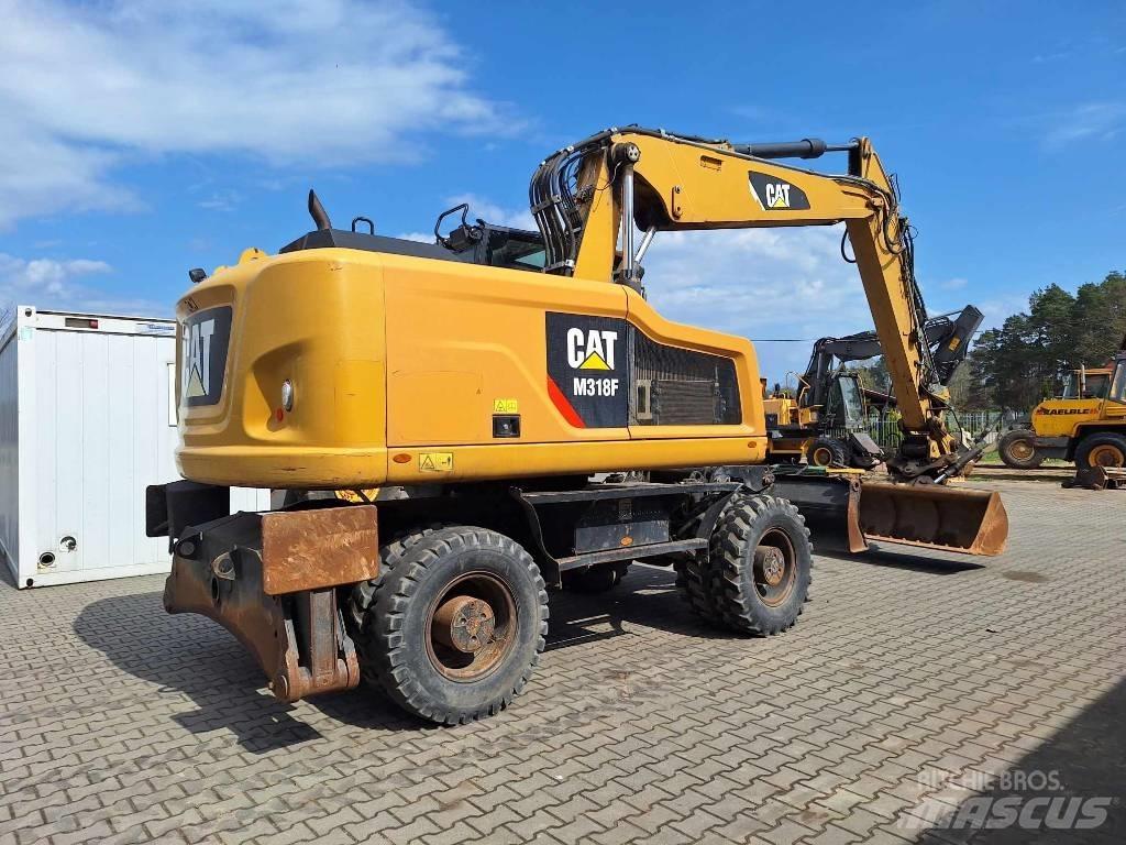 CAT M 318 F Escavatori gommati