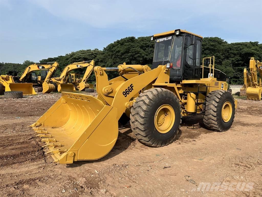 CAT 966F Pale gommate