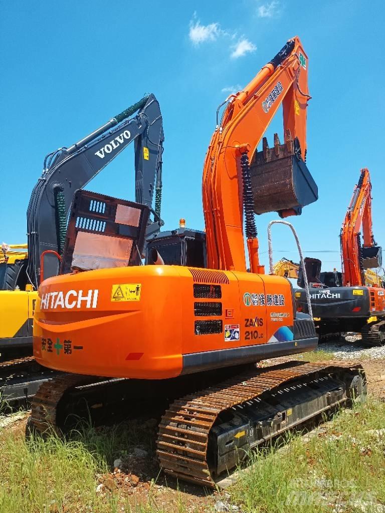 Hitachi ZX 210 Movimentazione rifiuti