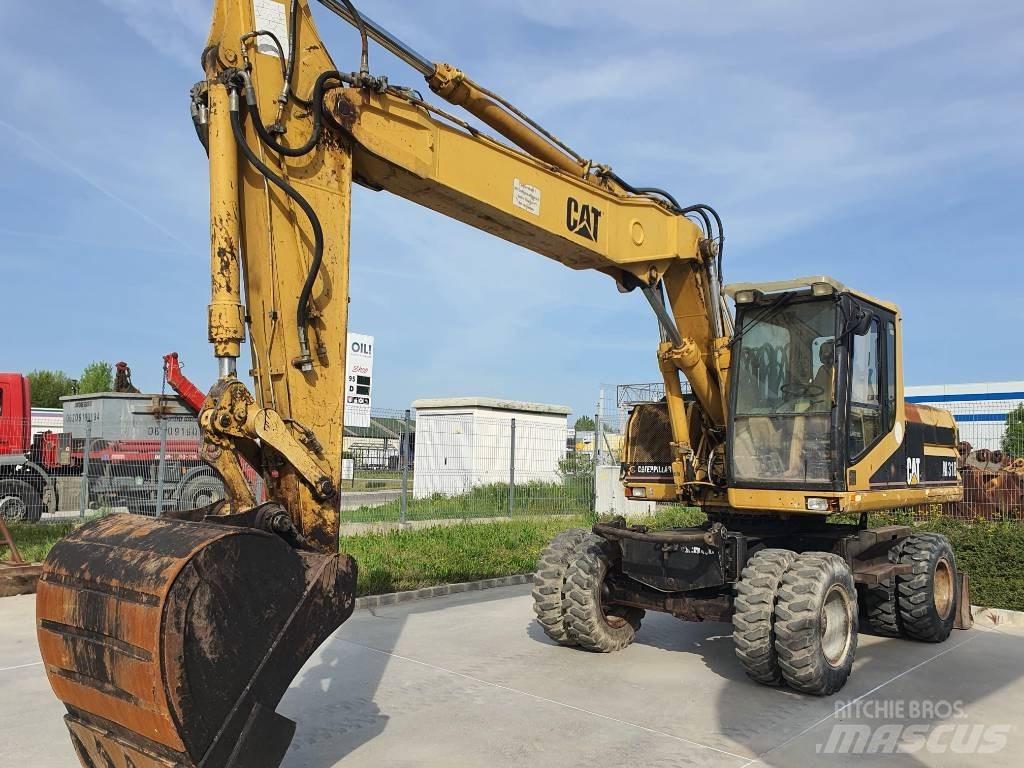 CAT M 318 Escavatori gommati