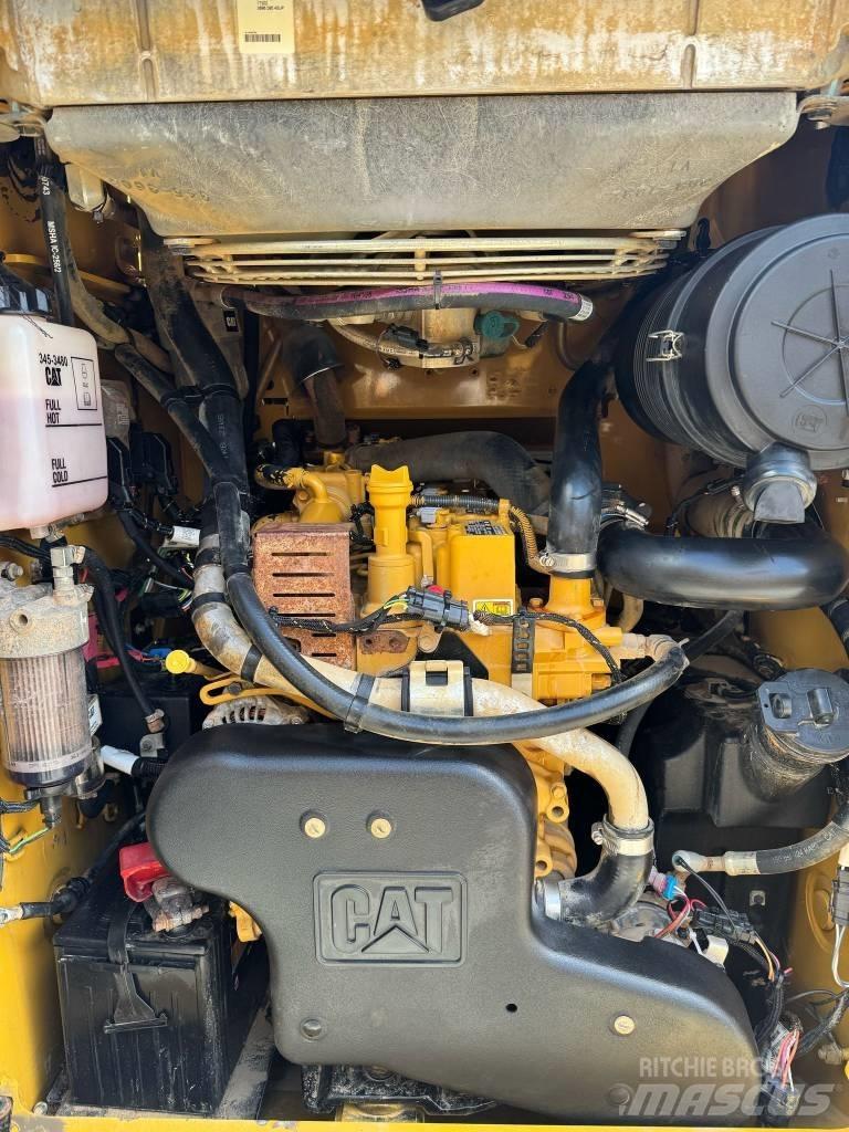CAT 289 D Mini Pale Gommate