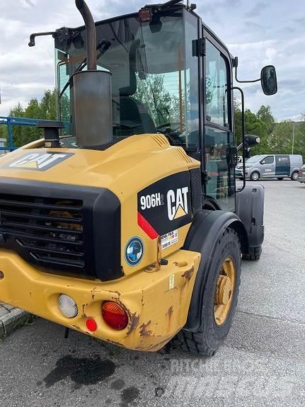 CAT 906hl Pale gommate